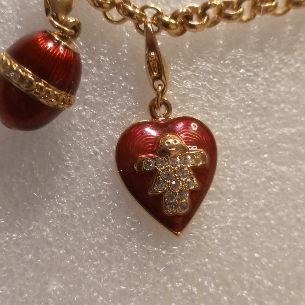 Faberge egg charm bracelet on a gold tone rolo chain. - Picture 9 of 16